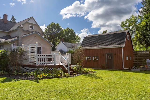 5 Eberenz St, Wellsboro, PA 16901 - view of yard featuring fence, a deck, an outdoor structure, and a barn