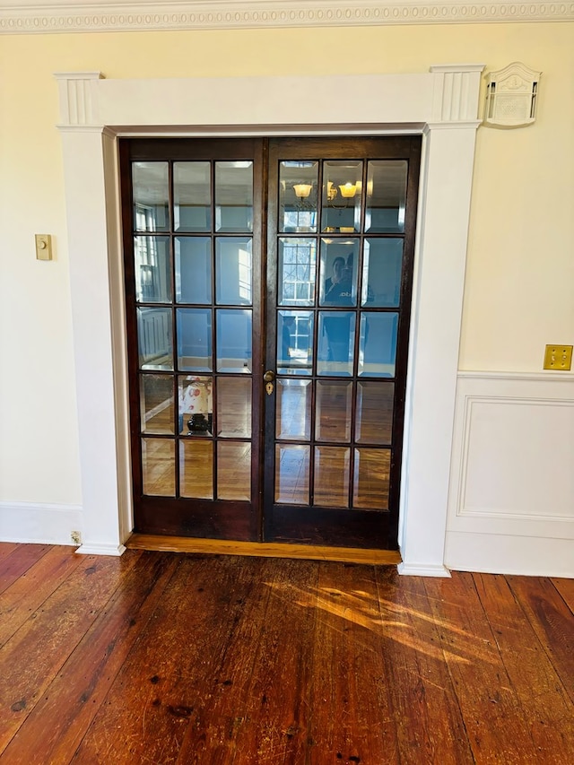 room details with french doors and wood-type flooring