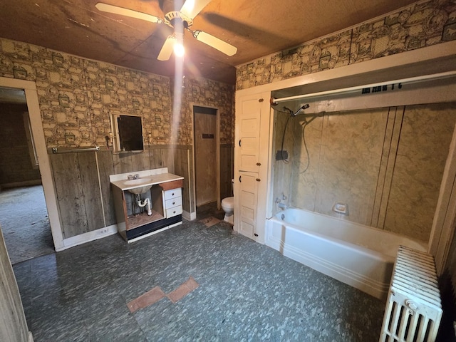118 Wilbur St, Waverly, NY 14892 - full bathroom with radiator heating unit, toilet, a ceiling fan, shower / bath combination, and vanity