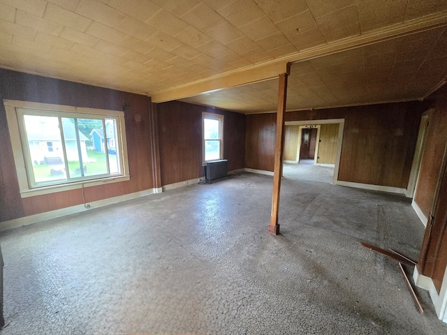 118 Wilbur St, Waverly, NY 14892 - empty room featuring wood walls and baseboards