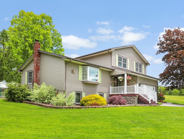 1817 Cotton Hollow Rd, Athens, PA 18810 - view of front of home with a chimney, a front yard, and covered porch