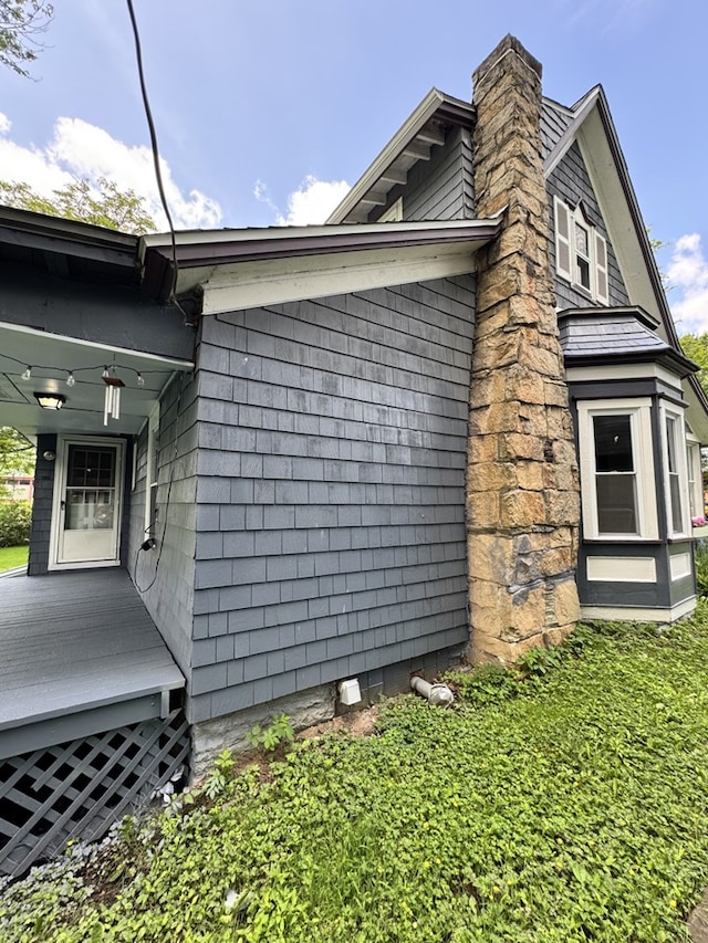 66 Benton St, Port Allegany, PA 16743 - view of property exterior with a chimney