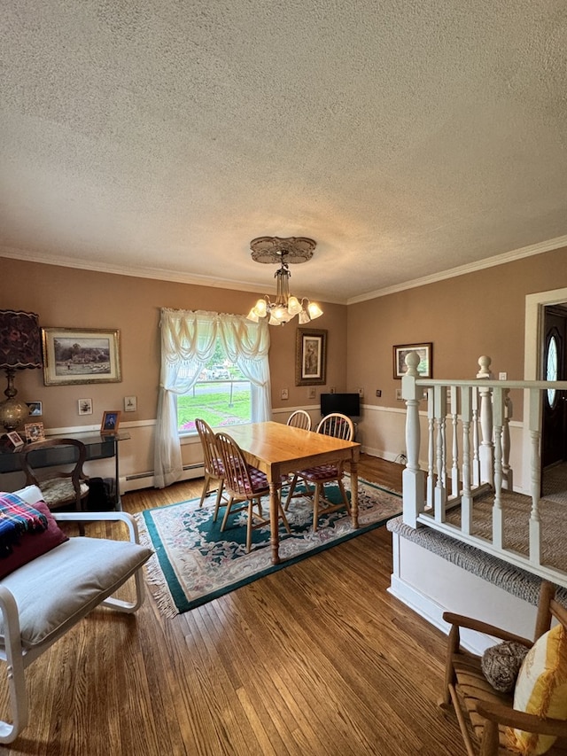66 Benton St, Port Allegany, PA 16743 - dining room with a textured ceiling, a chandelier, crown molding, and wood finished floors