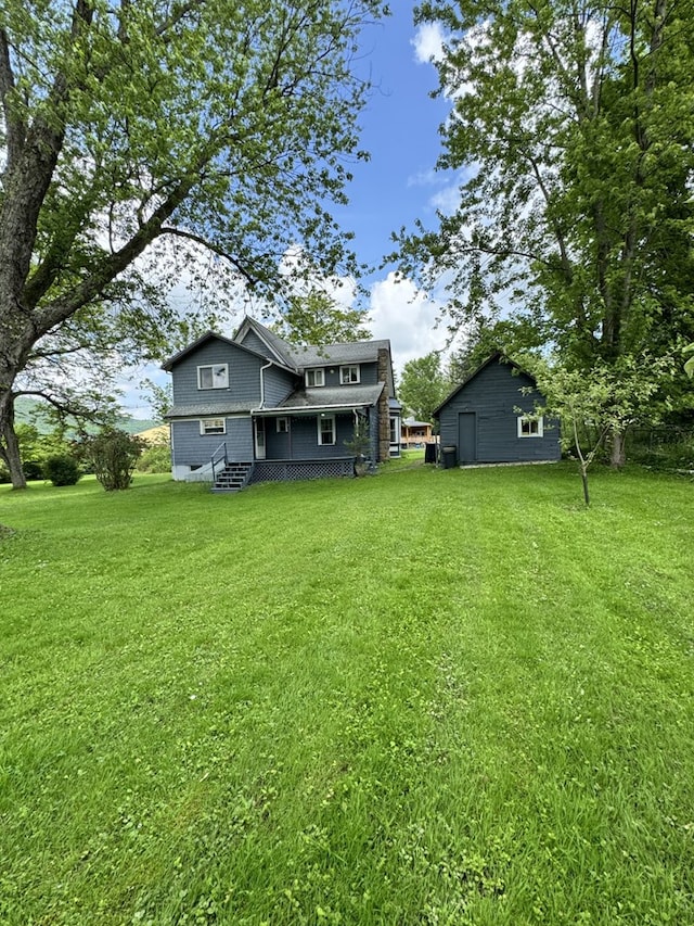 66 Benton St, Port Allegany, PA 16743 - back of property with a yard