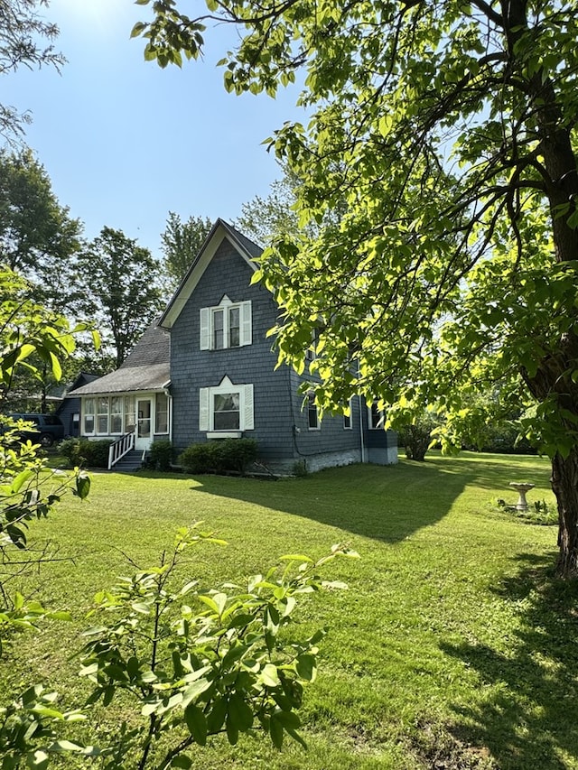 66 Benton St, Port Allegany, PA 16743 - view of property exterior featuring a lawn