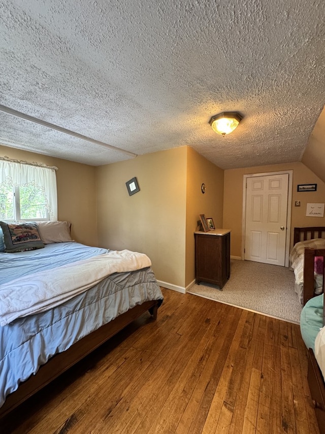 66 Benton St, Port Allegany, PA 16743 - bedroom featuring wood-type flooring and a textured ceiling