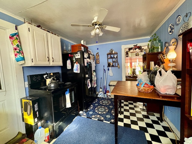 kitchen featuring dark floors, a ceiling fan, white cabinetry, black appliances, and crown molding