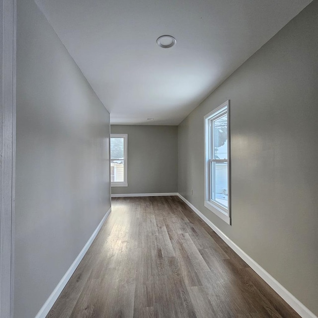 empty room featuring wood-type flooring