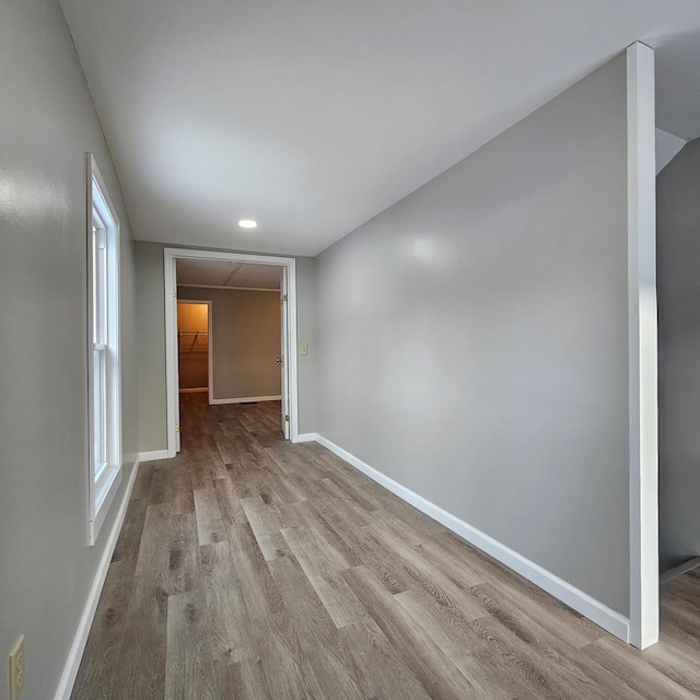 spare room featuring light hardwood / wood-style flooring