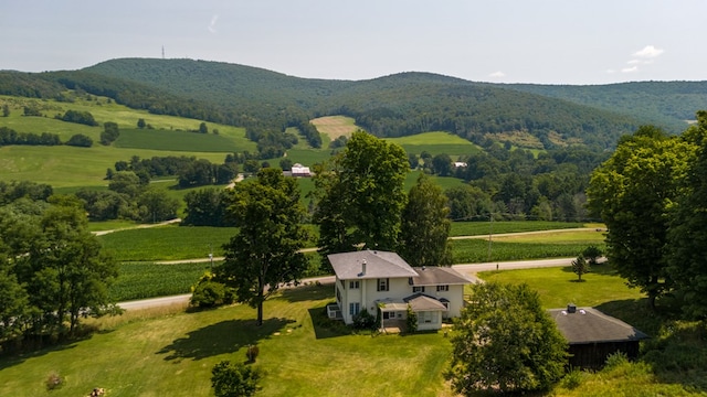 birds eye view of property featuring a mountain view and a rural view