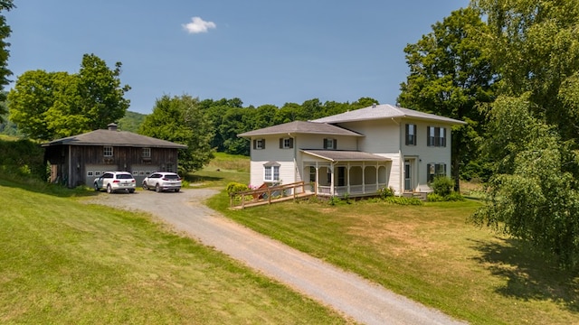 view of front of house featuring a front yard and a porch