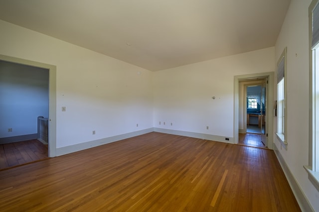 spare room featuring hardwood / wood-style floors