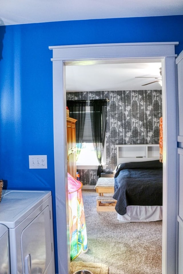 bedroom with washer and dryer