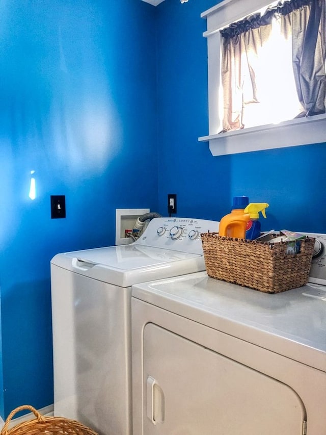 washroom with washer and clothes dryer