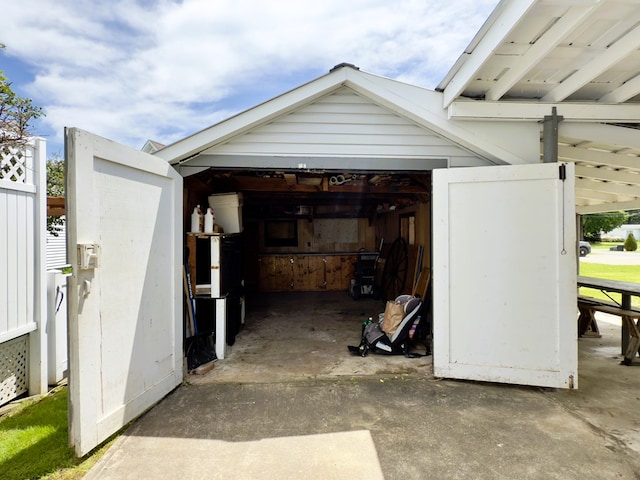113 1st St, Shinglehouse, PA 16748 - garage featuring concrete driveway
