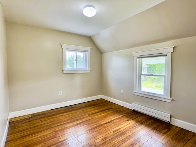113 1st St, Shinglehouse, PA 16748 - bonus room featuring a baseboard heating unit, hardwood / wood-style flooring, lofted ceiling, and baseboards