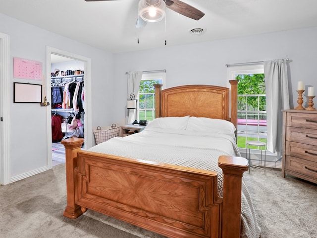 17899 Rte 6, Towanda, PA 18848 - bedroom featuring light colored carpet, a spacious closet, a closet, and a ceiling fan