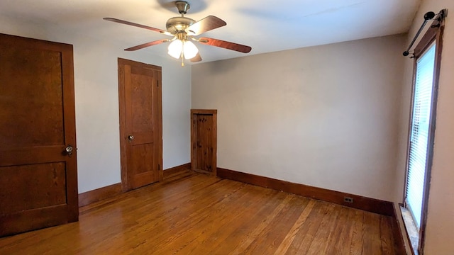 unfurnished bedroom featuring ceiling fan and light hardwood / wood-style floors