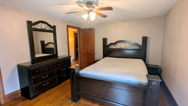 bedroom with ceiling fan and light hardwood / wood-style floors