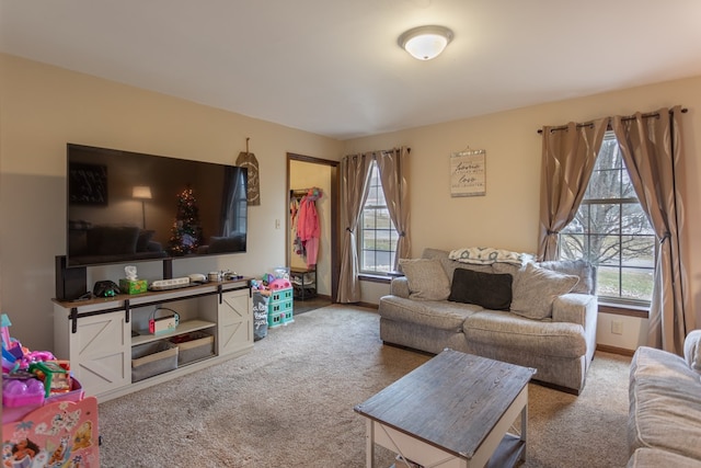 carpeted living room featuring a healthy amount of sunlight