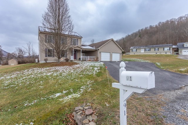 view of front of house featuring a porch and a front lawn