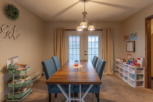 carpeted dining area featuring french doors and baseboard heating