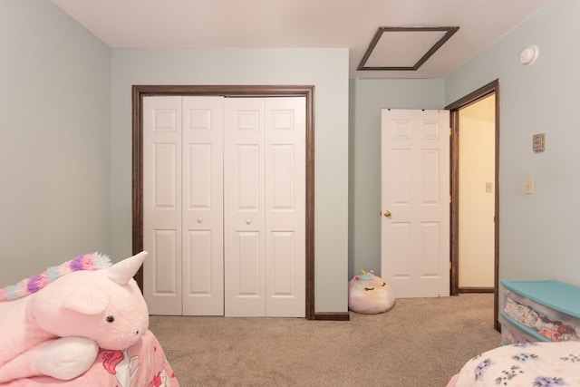 bedroom with carpet flooring and a closet