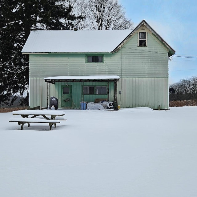 view of snow covered property