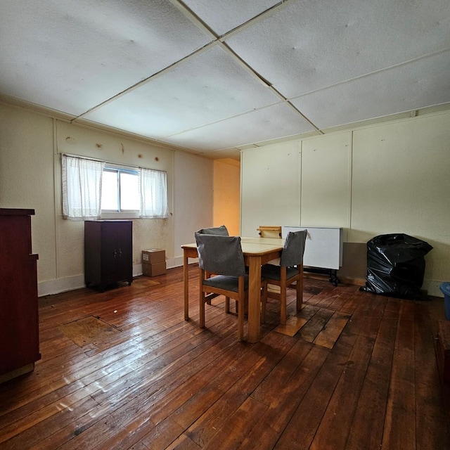 dining room with dark hardwood / wood-style floors