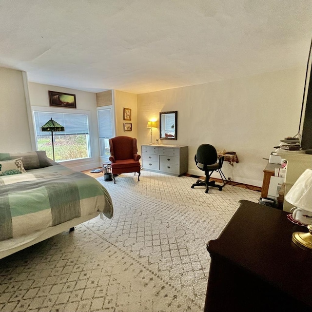 bedroom with light colored carpet