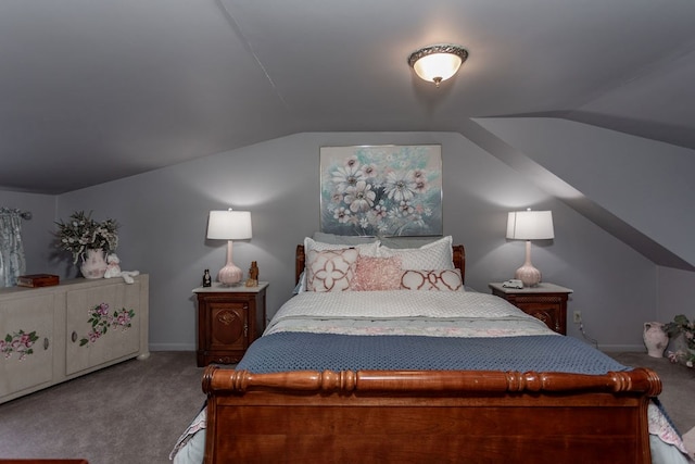 carpeted bedroom with vaulted ceiling