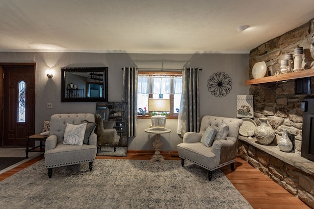 living area featuring hardwood / wood-style floors