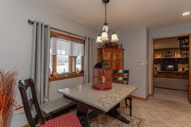 dining area featuring a fireplace