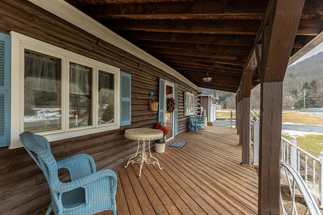 wooden deck featuring a porch