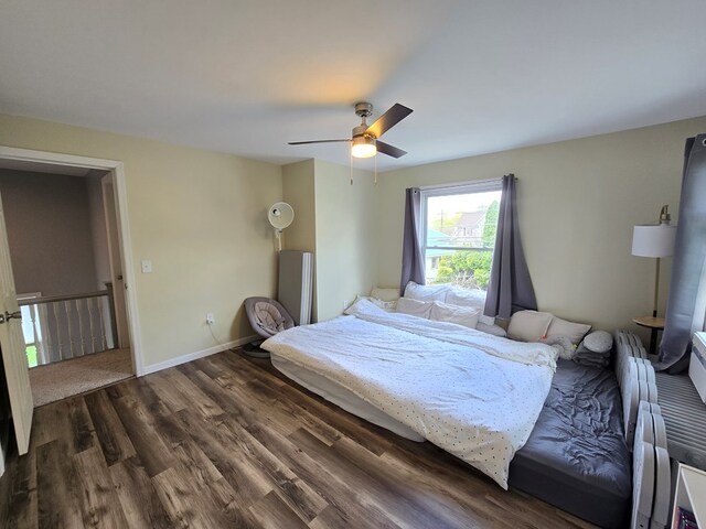 97 Lincoln St, Sayre, PA 18840 - bedroom featuring a ceiling fan, multiple windows, wood finished floors, and baseboards