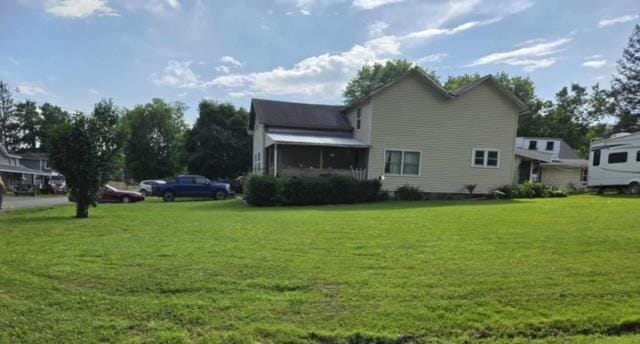 79 Back St, Millerton, PA 16936 - back of property featuring a lawn