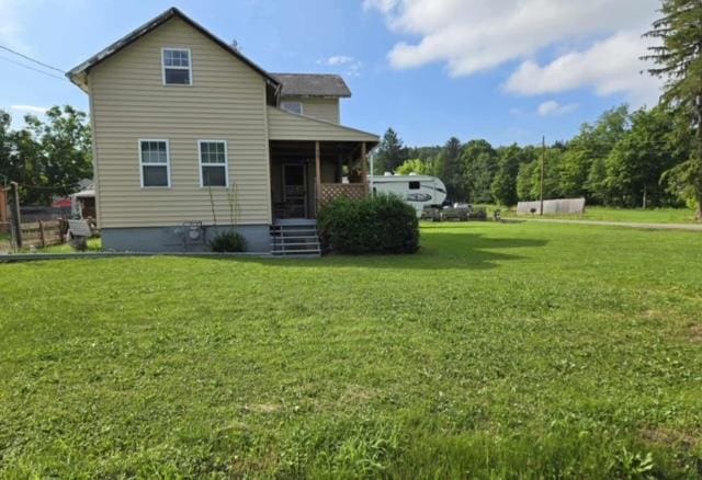 79 Back St, Millerton, PA 16936 - rear view of house featuring a yard