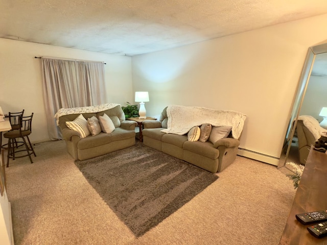 carpeted living room with baseboard heating and a textured ceiling