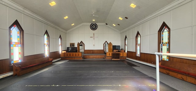 rec room featuring plenty of natural light, lofted ceiling, and crown molding