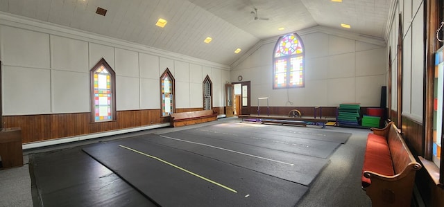 game room featuring crown molding, vaulted ceiling, ceiling fan, a baseboard radiator, and wood ceiling