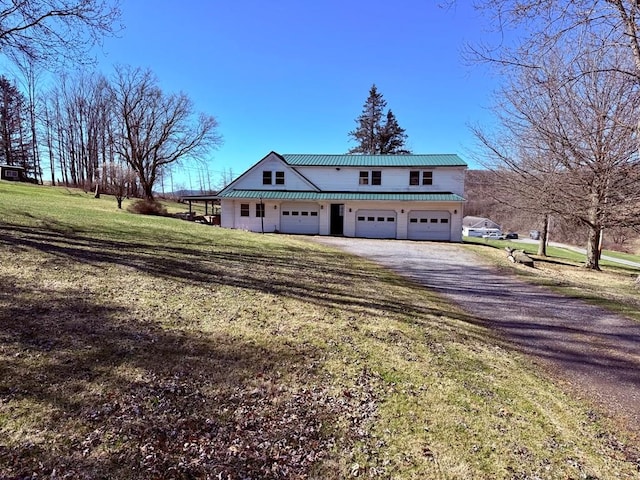 116 Morral Rd, Wellsboro, PA 16901 - view of front of property with aphalt driveway, a garage, a front lawn, and metal roof