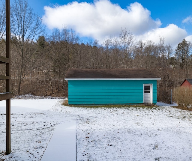 view of snow covered garage