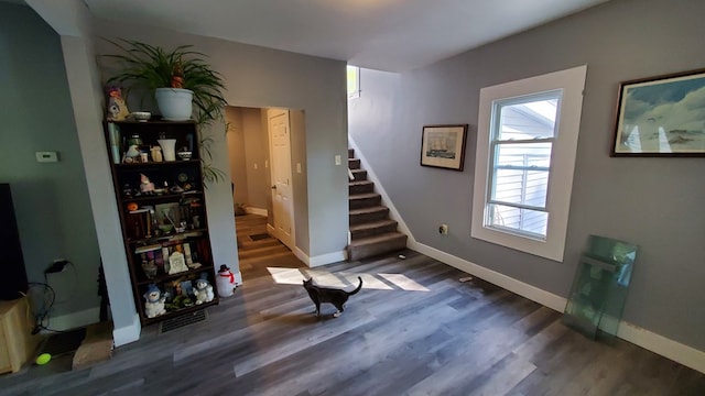 298 Lackawanna Ave, Owego, NY 13827 - sitting room with stairs, wood finished floors, and baseboards