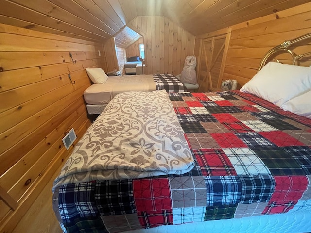 16 Quarry Ln, Galeton, PA 16922 - bedroom with visible vents, wood walls, wood ceiling, and lofted ceiling