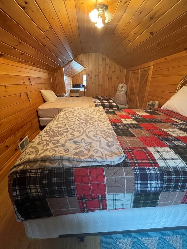 16 Quarry Ln, Galeton, PA 16922 - bedroom featuring wooden walls, wood ceiling, and lofted ceiling
