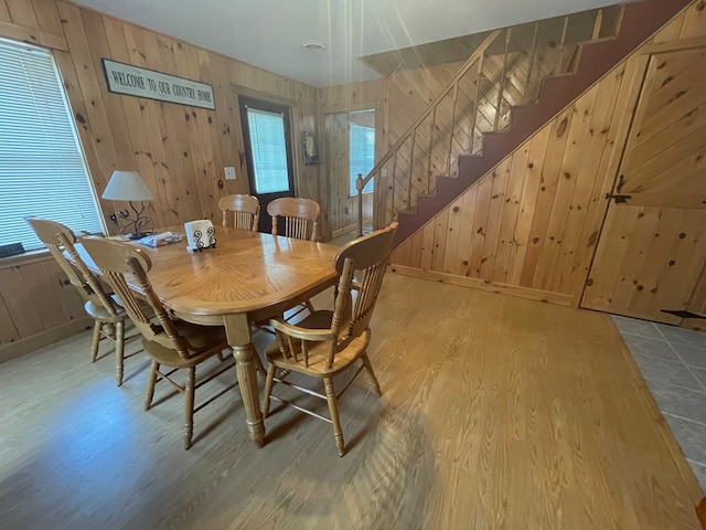 16 Quarry Ln, Galeton, PA 16922 - dining space with wooden walls, stairs, and wood finished floors