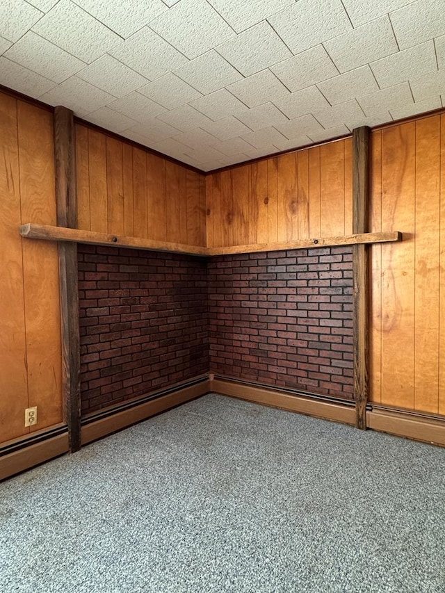 spare room with wooden walls