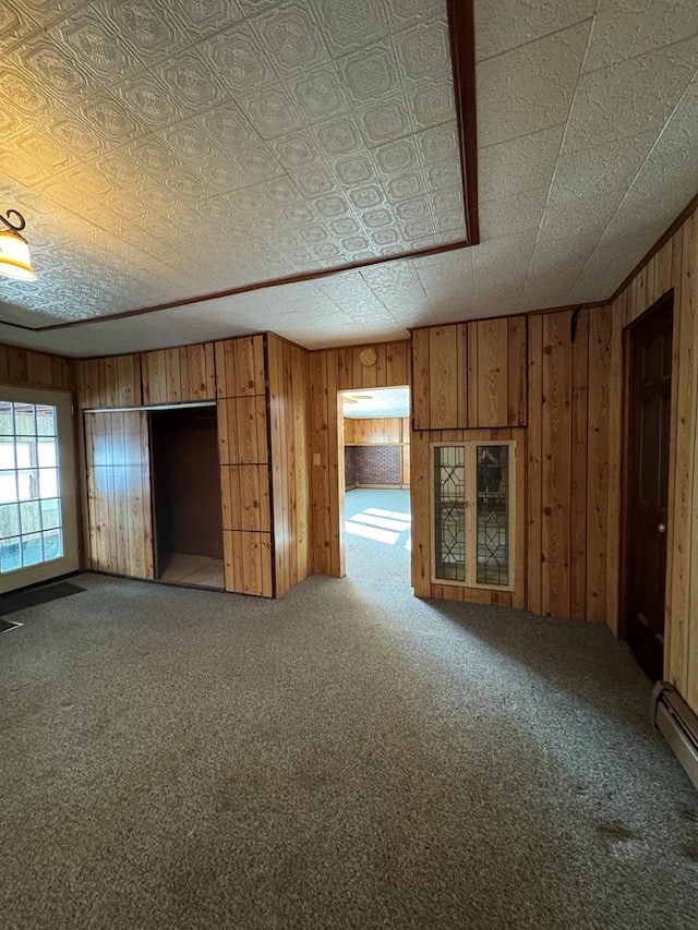 unfurnished living room with carpet