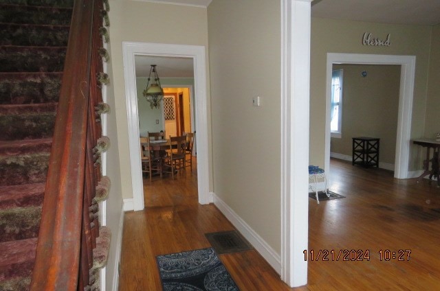 hall featuring hardwood / wood-style flooring