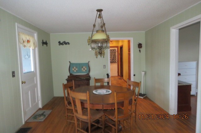 dining room featuring hardwood / wood-style flooring